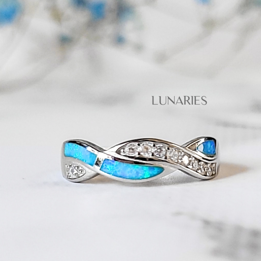 925 Sterling Silver Blue Opal Inlay Infinity Twist Ring with CZ Accents
